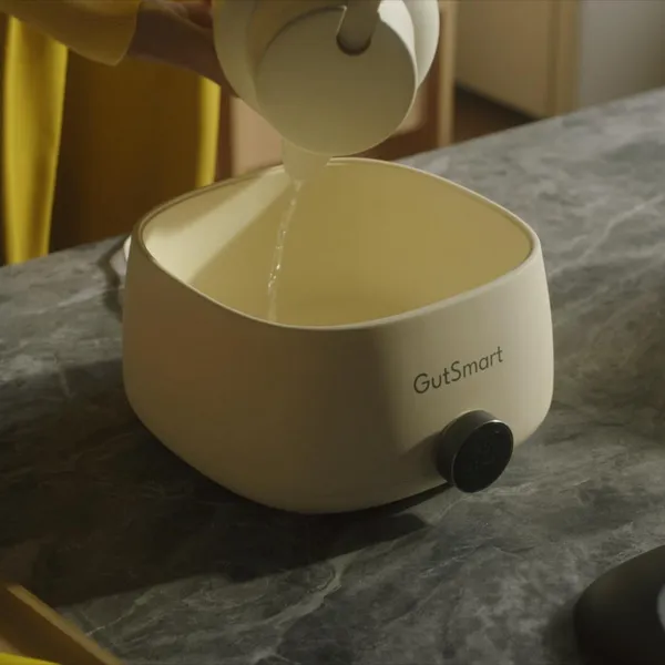 Close-up of wellness routine preparation with starter culture packets