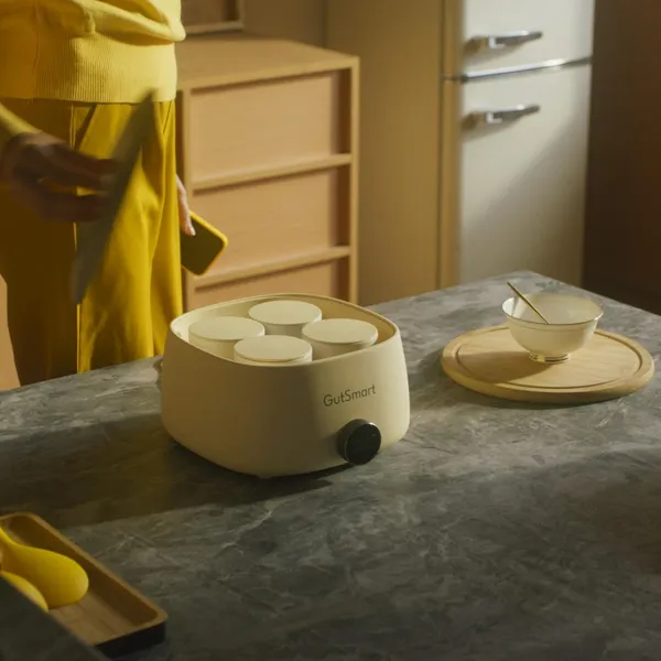 Close-up of homemade yogurt preparation using GutSmart